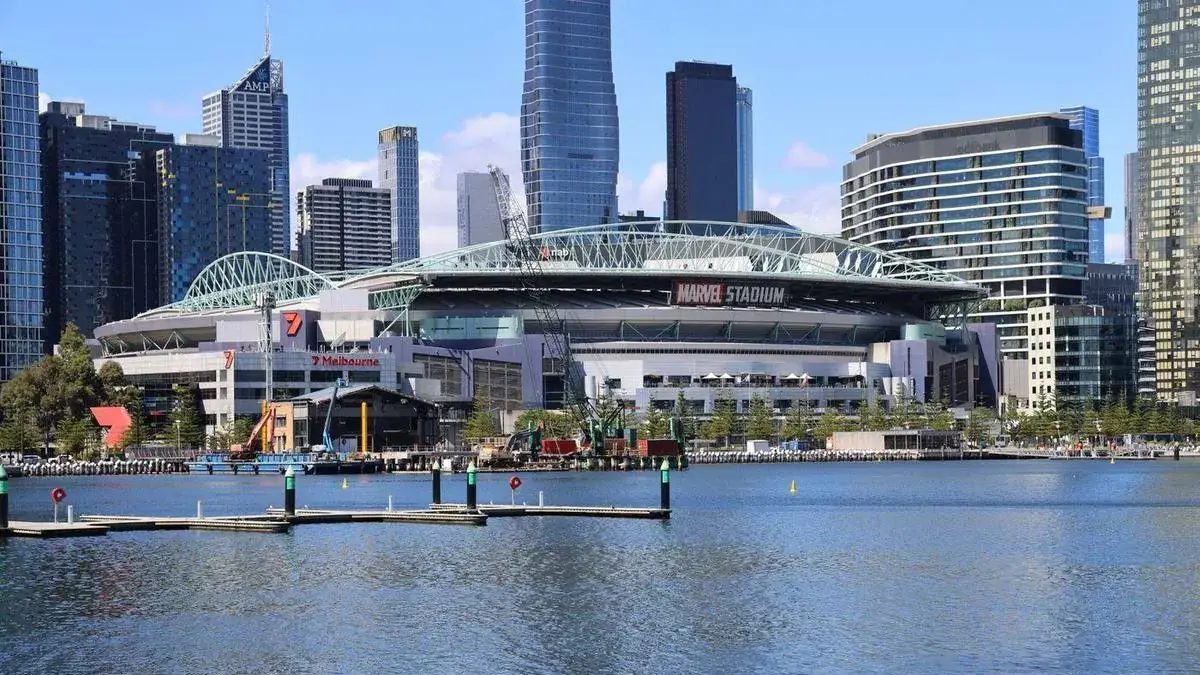 Melbourne skyline featuring Marvel Stadium and the Yarra River waterfront, Australia, one of two countries compared in this post-study work guide