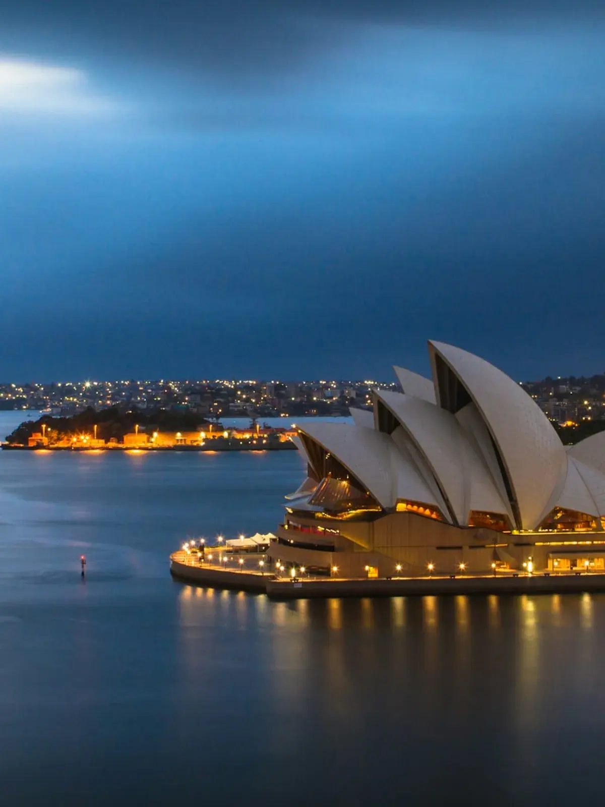Sydney Opera House on the harbour at dusk, Australia